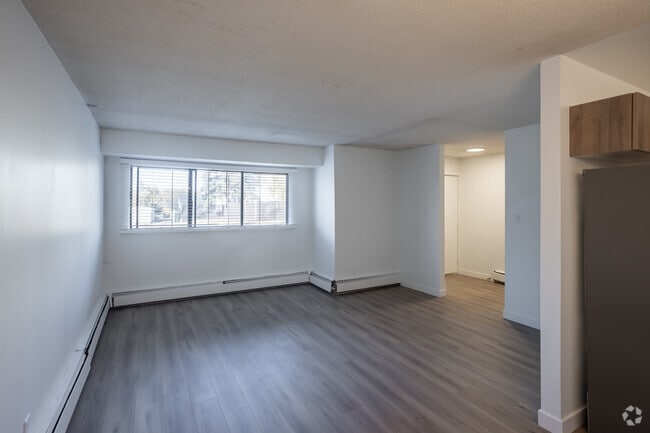 3BR, 2BA - 1,254SF - Living Room - South Ridge Apartments
