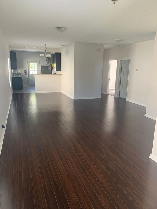 Building Photo - Remodeled three bedroom two bath home with...