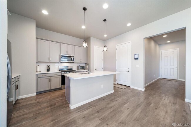 Building Photo - New ranch style home with a finished basem...