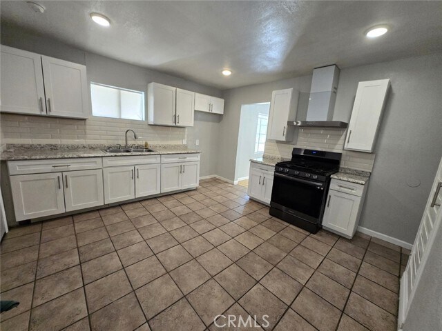 Building Photo - 16466 Arrow Blvd
