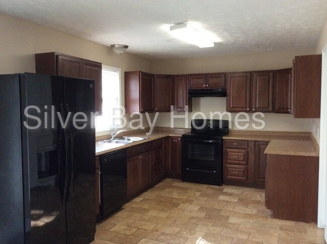 Building Photo - 2310 Mills Wood Run