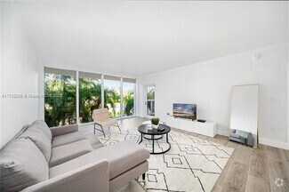 Building Photo - 10275 Collins Ave