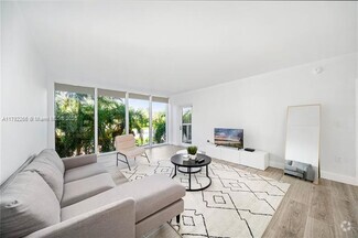 Building Photo - 10275 Collins Ave