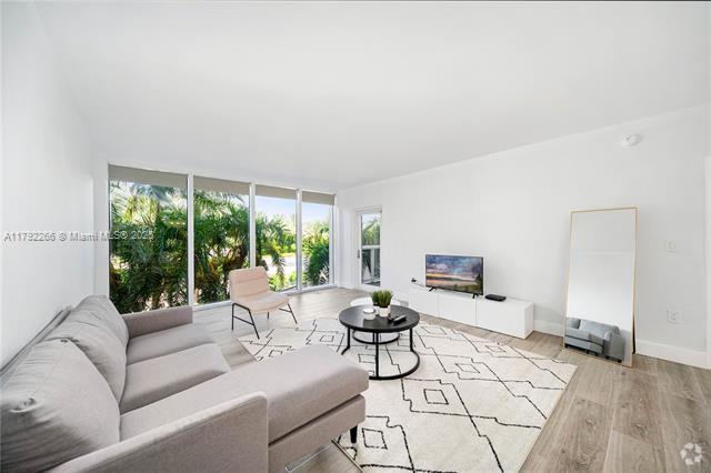 Building Photo - 10275 Collins Ave