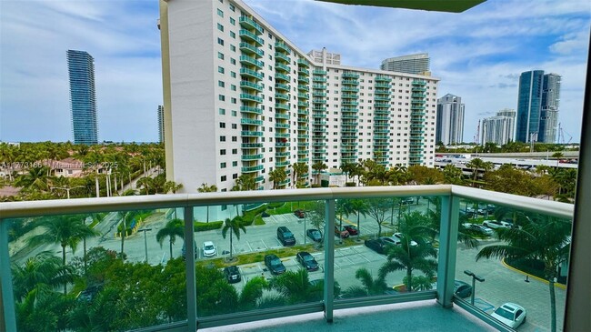 Building Photo - 19390 Collins Ave