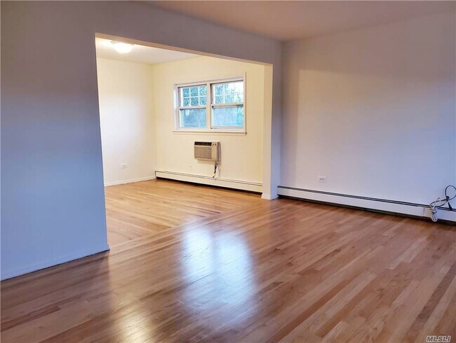 Building Photo - 211-14-211-41 41st Ave