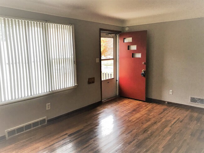 Living Room with large picture window - 6642 Emmet St