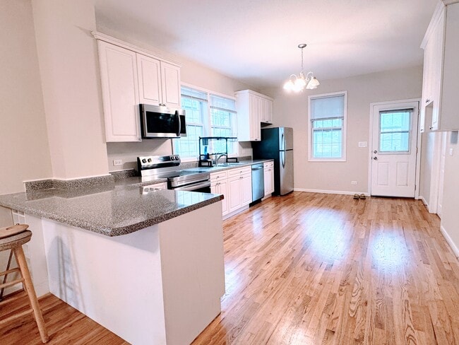 Kitchen with room for an island and eat-in peninsula - 2146 N Campbell Ave