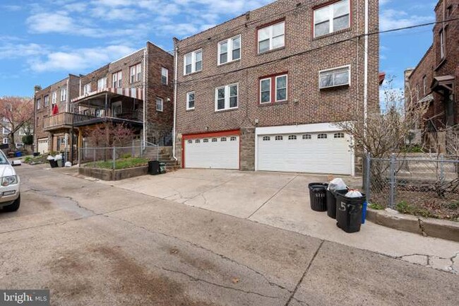 Rear driveway and garage - 5734 Woodbine Ave
