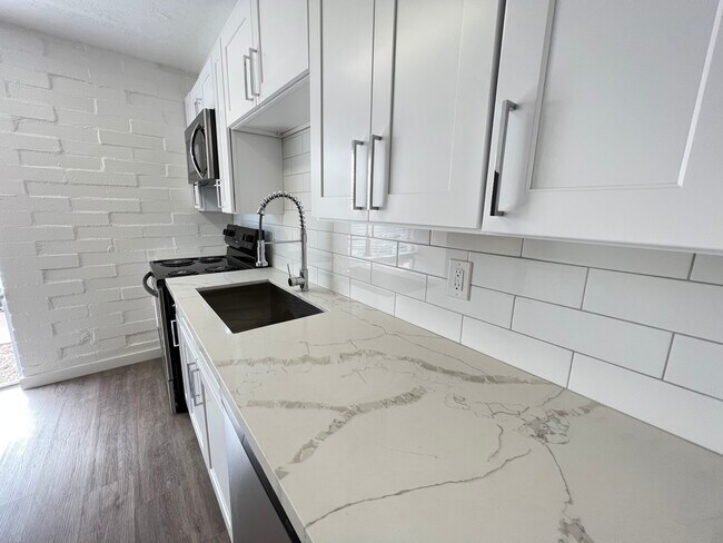 Vista de la cocina remodelada - Palisade Flats