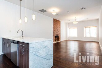 Building Photo - East Village 3 Bdr/2 Bath Duplex with Private Garden & Condo Finishes!