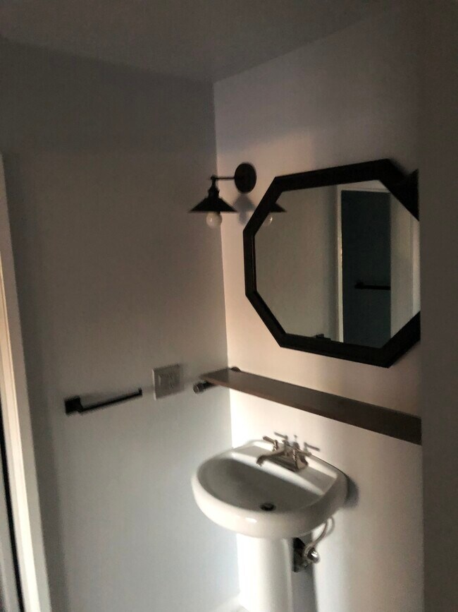 Bathroom mirror. - 155 Sharene Ln