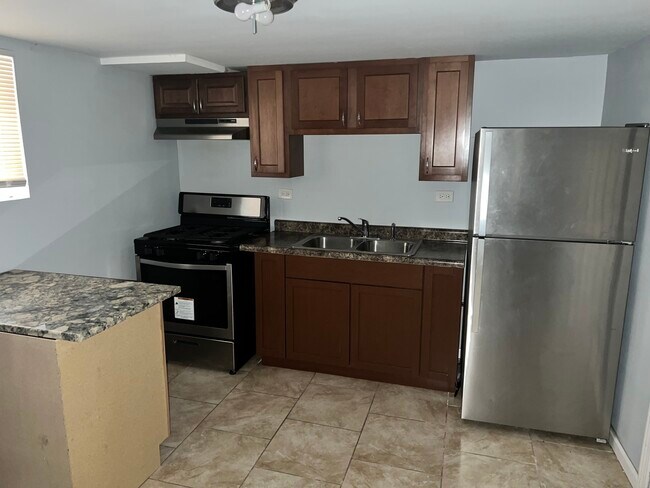 Foto del edificio - 7442 S Maplewood Ave