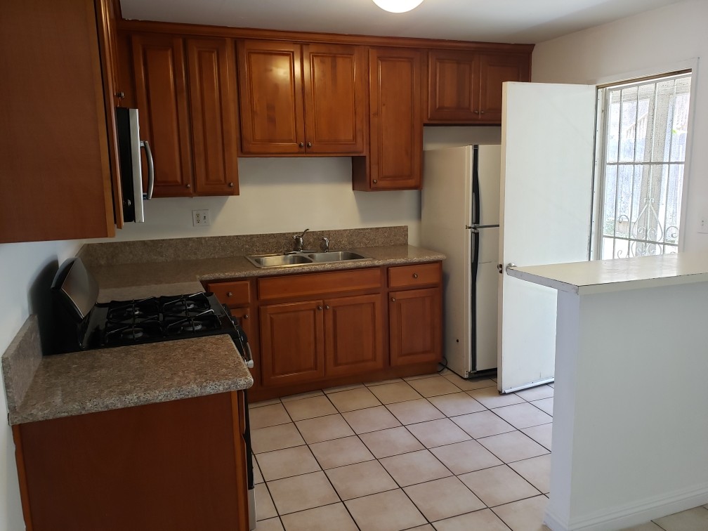 new kitchen cabinets and granite countertop - 3450 Monroe St