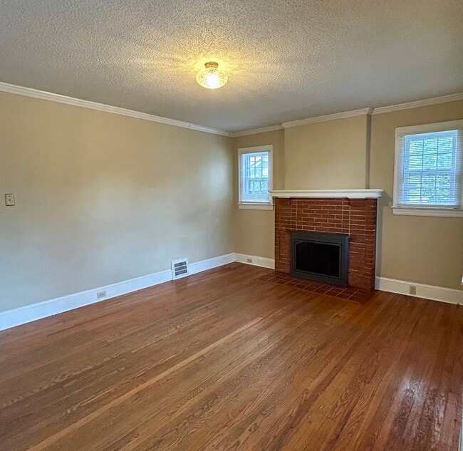 Living room with fireplace - 708 S Broad St