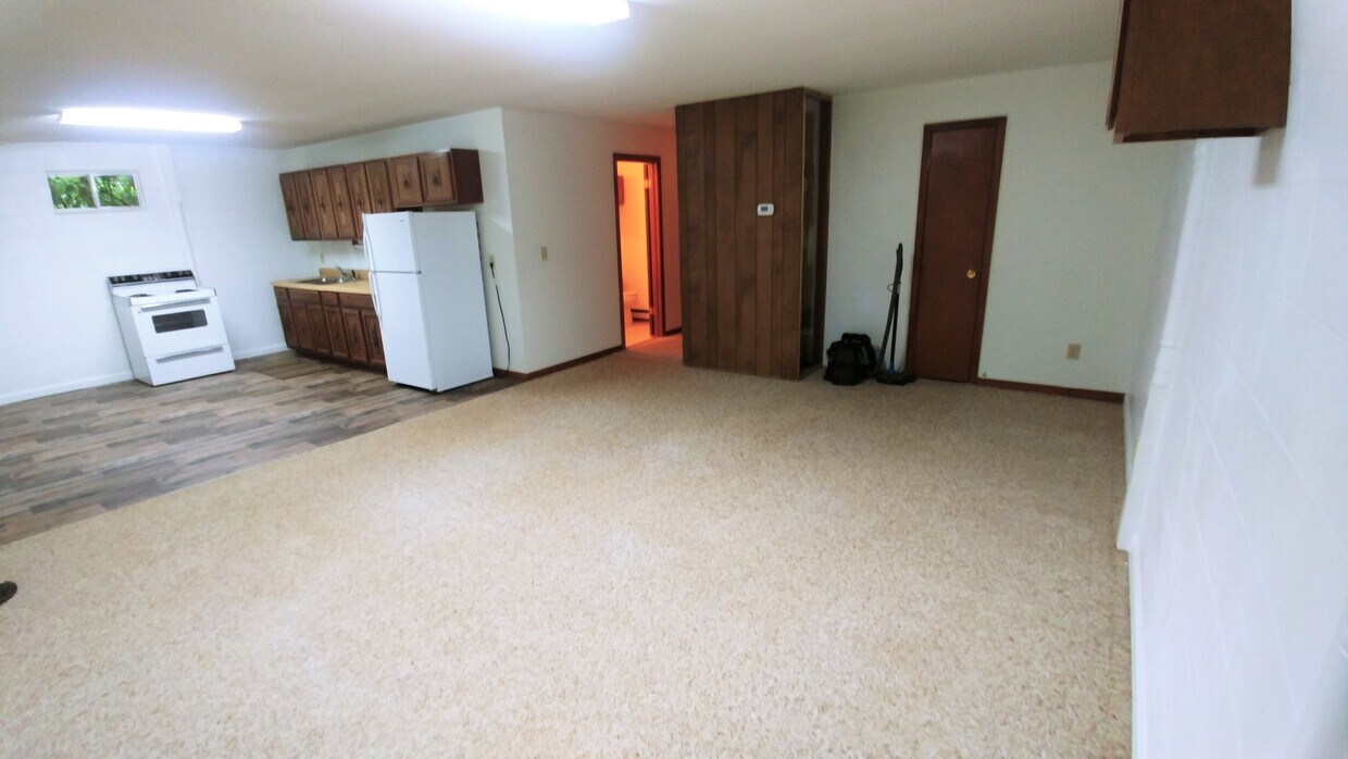 Open kitchen and living area - 5650 Spainhour Mill Rd