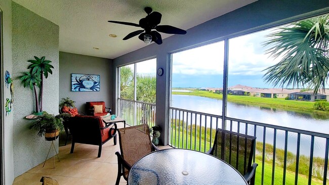 Southwest facing lanai overlooking a pond and beautiful sunsets - 16570 Goldenrod Ln