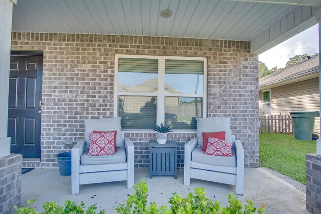 Building Photo - Season’s Savings! Spacious 5BR Near NAS – ...