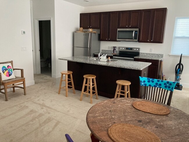 Kitchen (if renting semi-furnished, furniture may not be these exact pieces) - 8780 Shapley St