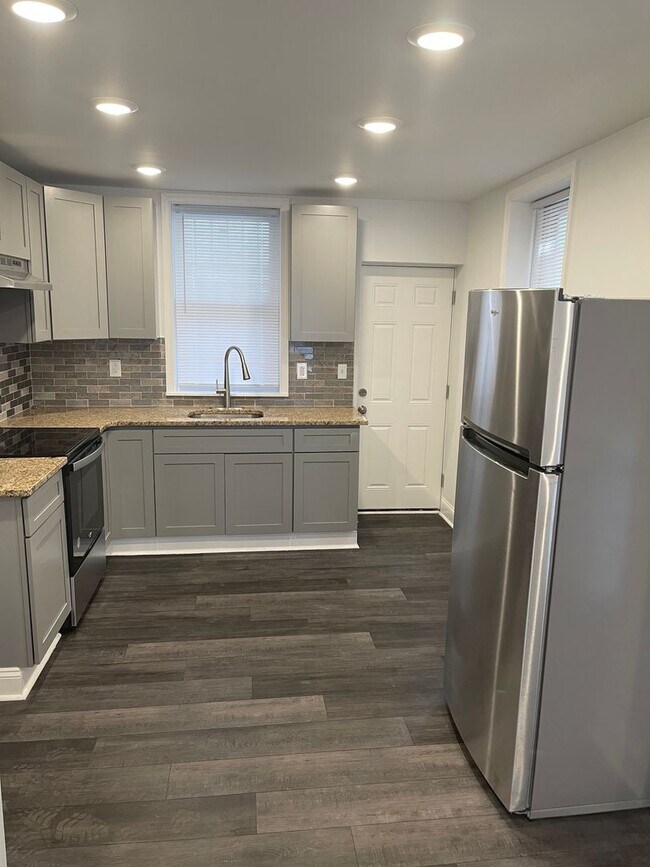 Building Photo - Beautifully Renovated 3 Bedroom House Now ...