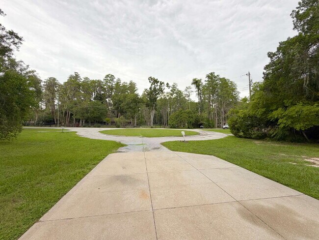 Foto del edificio - "Charming 3-Bedroom Gem in Land O' Lakes – Your Cozy Retreat Awaits!"