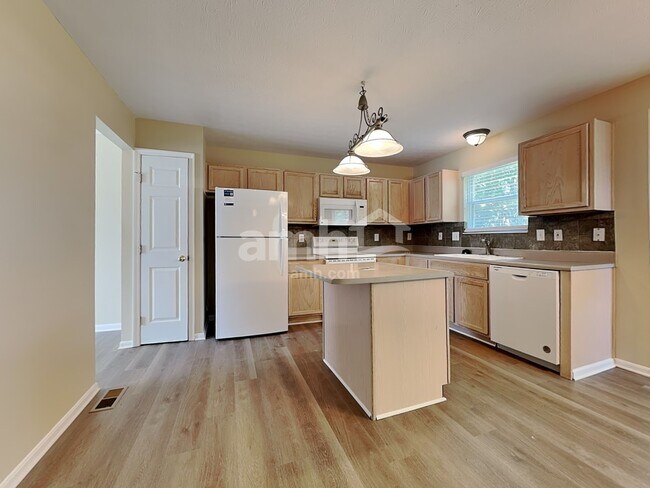 Foto del edificio - 1004 Wild Flower Ln