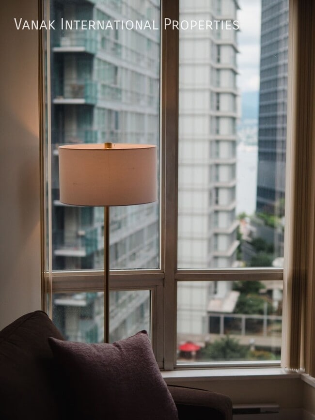 Building Photo - Modern 1BR Furnished Condo ? Renovated in ...