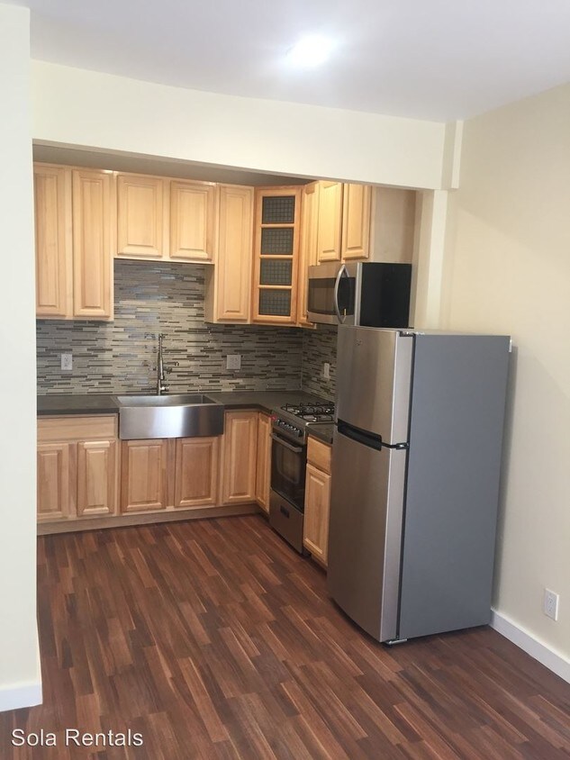 Foto principal - 8629 S Vermont Ave