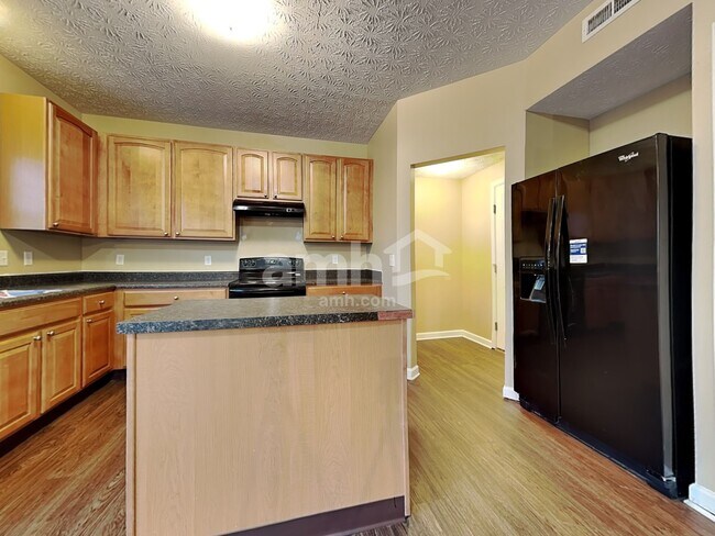 Foto del edificio - 5117 Rivers Edge Blvd