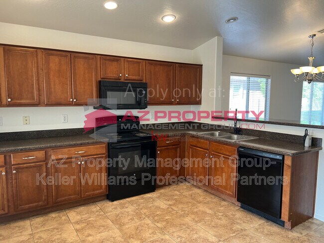 Building Photo - 12827 W Desert Mirage Dr