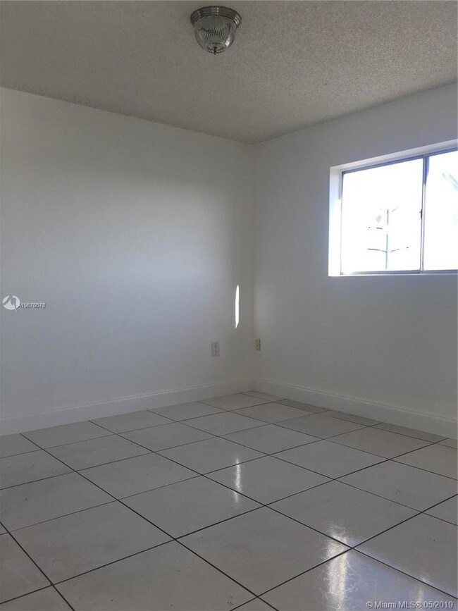 Building Photo - 6130 W 21st Ct