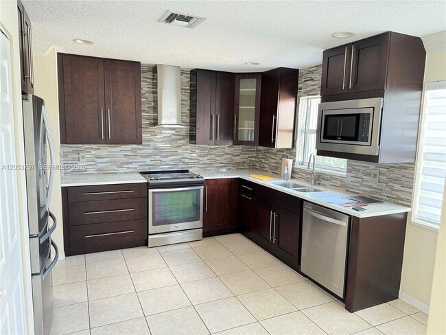 Photo - 7129 Crescent Creek Way, Coconut Creek, FL 33073 - 3148 House