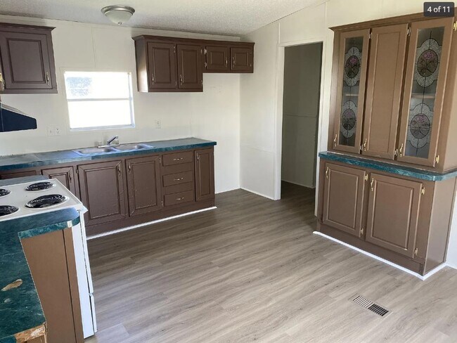 Foto del edificio - 1118 Melvin Dupuis Rd