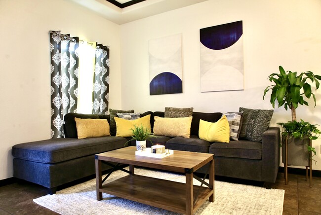 Spacious living room area. - 801 E Daffodil