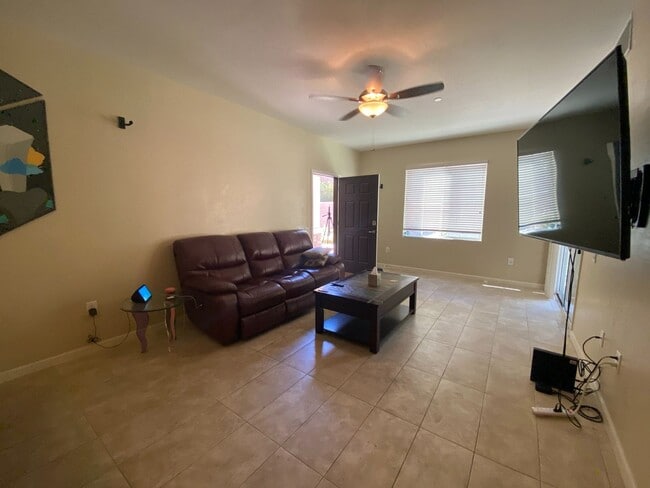 Building Photo - First Floor Unit with 2 Car Garage with Di...