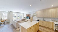 Located at 169 Johnson Rd in Morris Plains, NJ, this well-appointed one-bedroom, one-bathroom residence offers a cohesive and modern living experience across a single floor. The open-concept kitchen and living area serves as the heart of the home, where light wood cabinetry, quartz countertops, a tile backsplash, and stainless steel appliances—including a gas range and French door refrigerator—create a clean, functional kitchen. A generous island provides additional prep and casual dining space, flowing naturally into the bright living area, which features light hardwood flooring, large windows admitting ample natural light, and room for a dedicated dining nook. The living space maintains a warm, neutral palette that carries throughout the entire residence. The bedroom offers a comfortable and calm retreat, with a double closet, a secondary closet, and a window with an outdoor view, providing a quiet and private atmosphere. The full bathroom is finished with light wood vanity cabinetry, a quartz countertop, large-format tile flooring, and a tub-shower combination enclosed with a sliding glass door. A dedicated closet completes the layout, adding practical storage. Neutral warm tones, recessed lighting, and consistent wood-toned finishes unify the space with a modern yet inviting character.