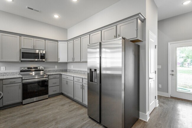 Building Photo - Be the first to live in Audrey's Park! Bra...