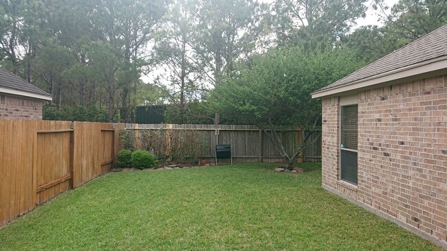 Another view of the backyard. - 7414 Lakesage Lane