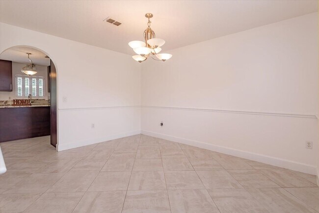 Building Photo - Comfort Meets Style in This Spacious Corner-Lot Home with Bonus Flex Room