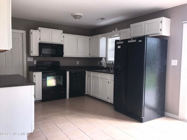 Foto del edificio - 709 Covington Ct
