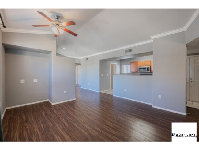 Building Photo - Ascend to a Life of Elegance in This Radia...