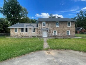 Building Photo - 6712 Hawkinsville Rd