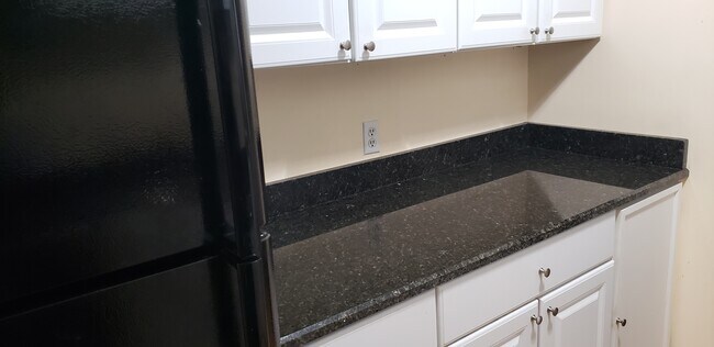 Kitchen -new granite - 310 Brook Village Rd