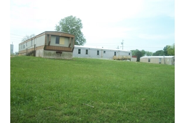 Building Photo - Peach Tree Village Community Living
