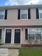 Building Photo - 1100-8E Pineland Ave