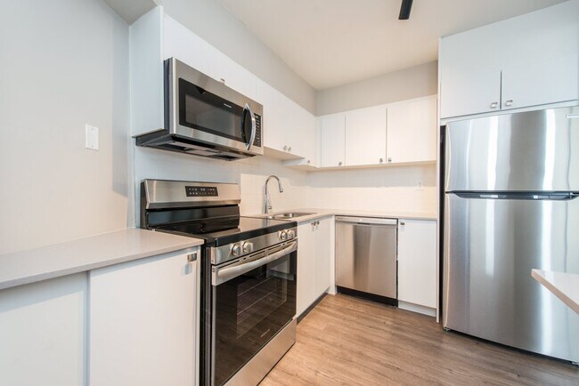 Photo du bâtiment - Two Ten Apartments
