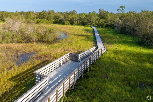 Boardwalks at Prairie Pines Preserve cross waterways near Jacaranda.