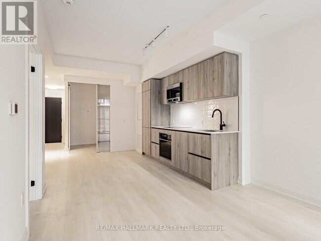 Photo du bâtiment - 117-2117 Broadway Ave