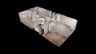 Located at 2820 Browns Dr in Henderson, Kentucky, this single-floor, 3-bedroom, 1-bathroom unit offers a practical and well-maintained living space. Throughout the home, wood-look luxury vinyl plank flooring provides a cohesive and durable finish, complemented by neutral gray walls and white trim.

The kitchen is outfitted with white shaker-style cabinetry extending to the ceiling for ample storage, granite-look countertops, a double sink, and white appliances including a refrigerator and electric range. A textured ceiling and flush-mount lighting complete the functional space.

Each of the three bedrooms features LVP flooring and its own closet with a hanging rod. The spacious primary bedroom includes a large walk-in-style closet, while the secondary bedrooms offer standard reach-in closets. One bedroom features an exposed painted concrete block wall with a window that brings in natural light, adding a distinctive character to the room.

The bathroom includes a tub/shower combination, a toilet, and a single-sink vanity with white cabinetry, all set on wood-look tile flooring. A central hallway connects the bedrooms to the main living areas, and a dedicated entry door leads directly into one of the rooms. The textured ceilings are consistent throughout, giving the home a uniform, tidy appearance.