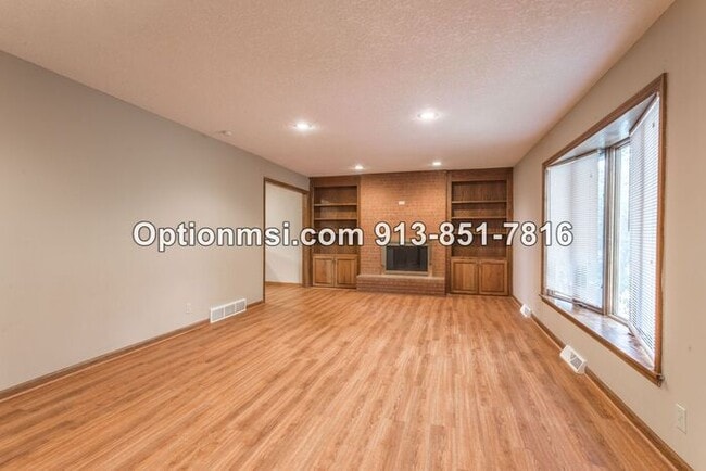 Building Photo - A MUST SEE at 143th and Quivira!